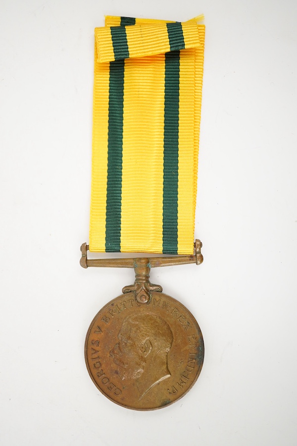 A George V Territorial Force War Medal 1914-19, unnamed. Condition - fair.